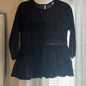 Black laced dress top. Can be dressed up or dressed down.